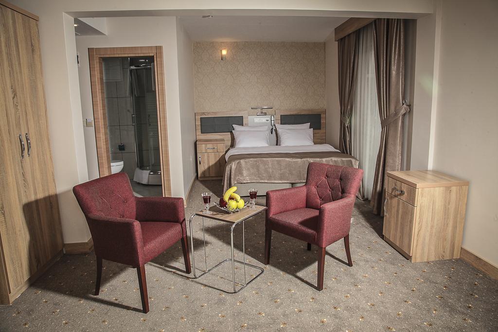 Remila Hotel コジャエリ 部屋 写真